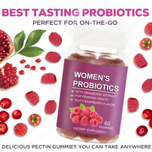 Load image into Gallery viewer, Bottle of women's probiotics with raspberry flavor surrounded by raspberries and pomegranate on a white background.
